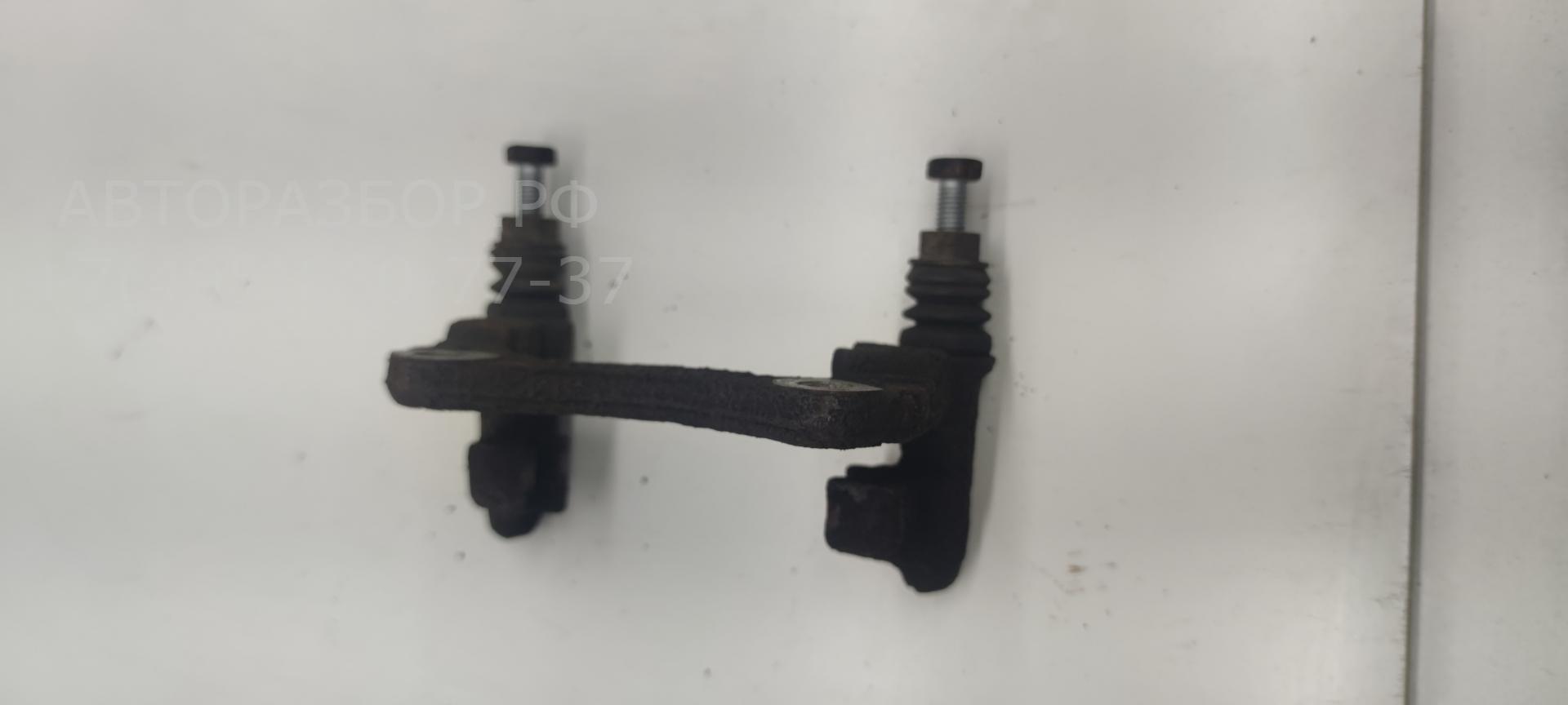 Скоба суппорта заднего
