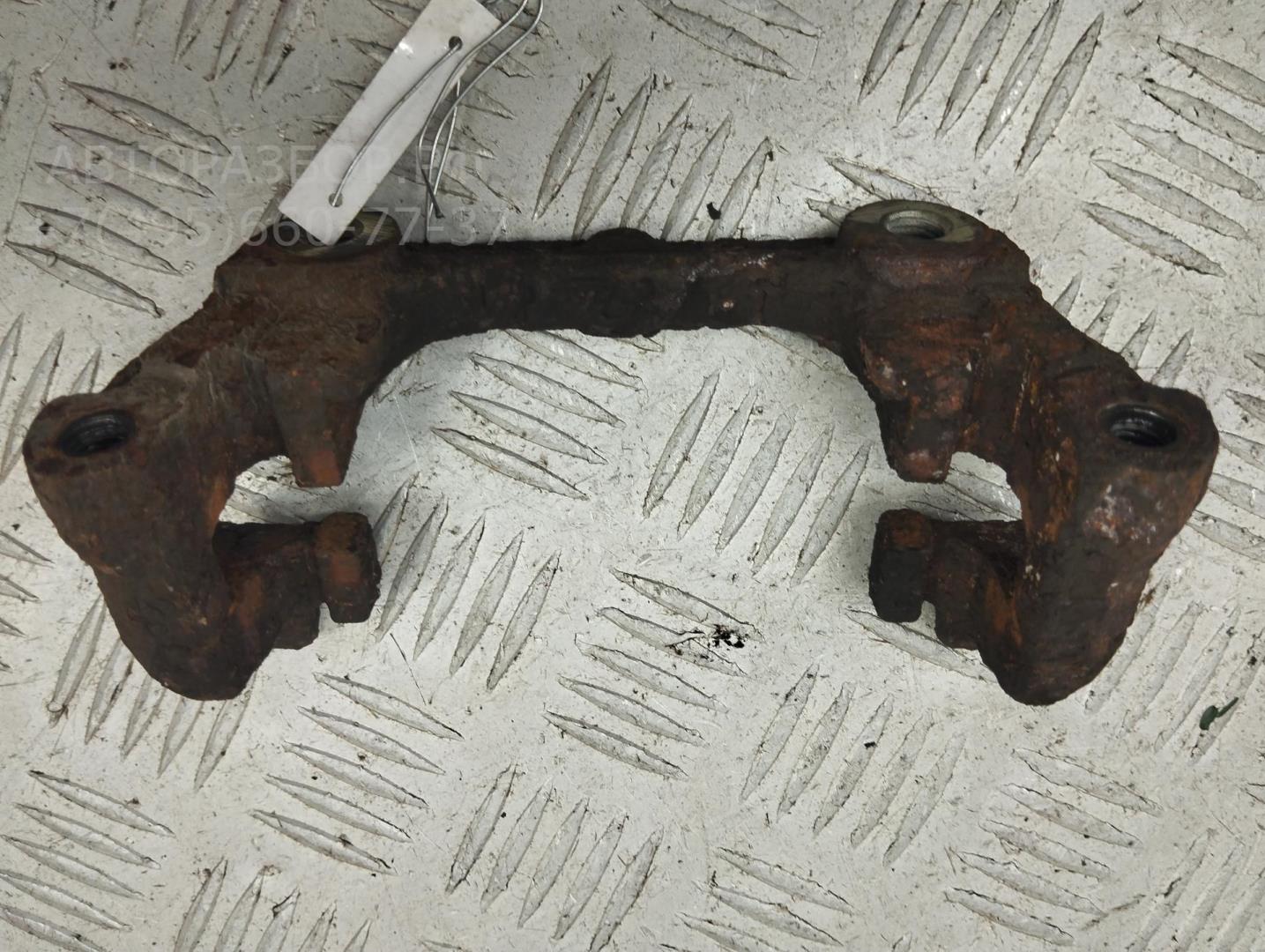 Скоба суппорта заднего