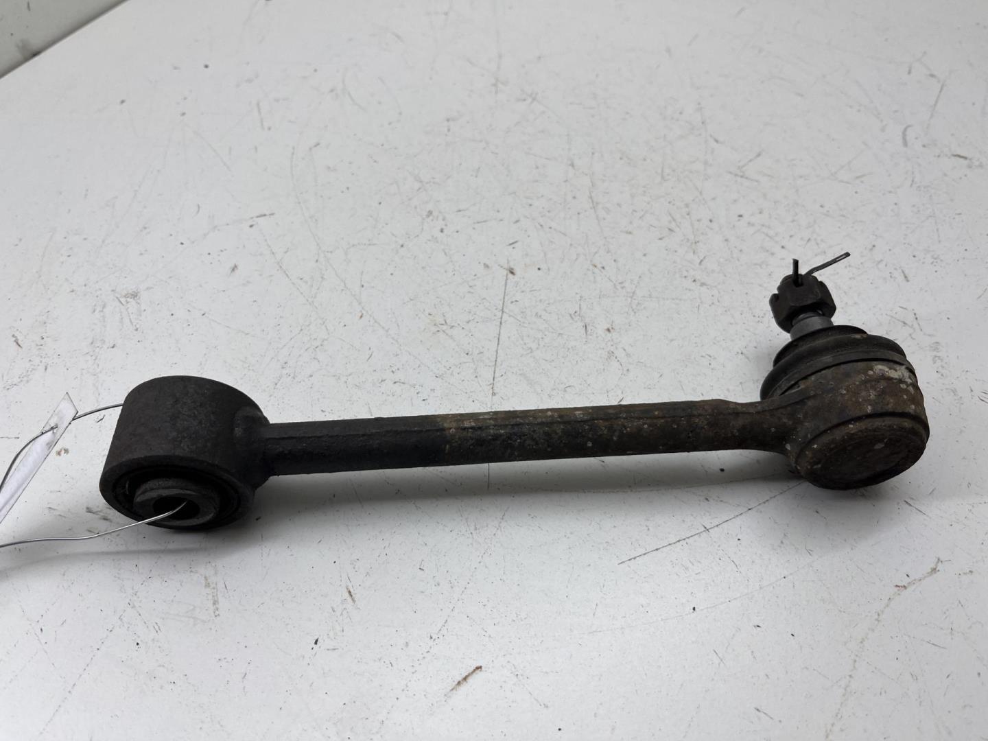 Рычаг задний левый