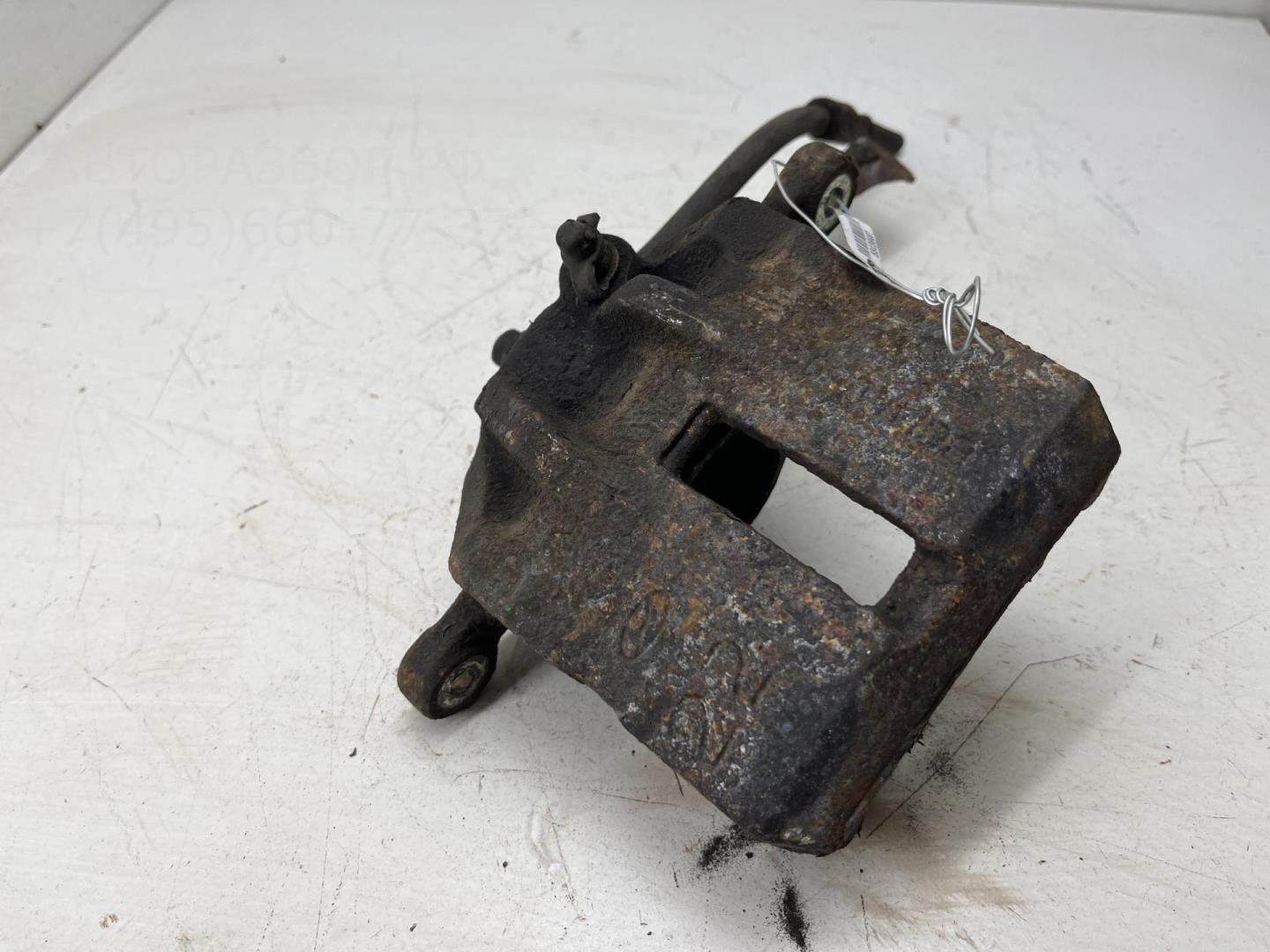 Суппорт передний левый