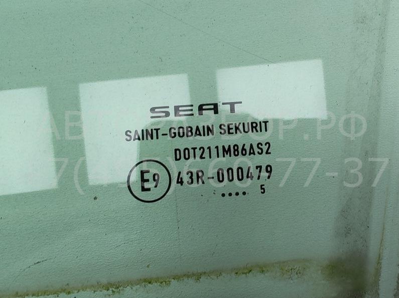 Стекло двери передней левой