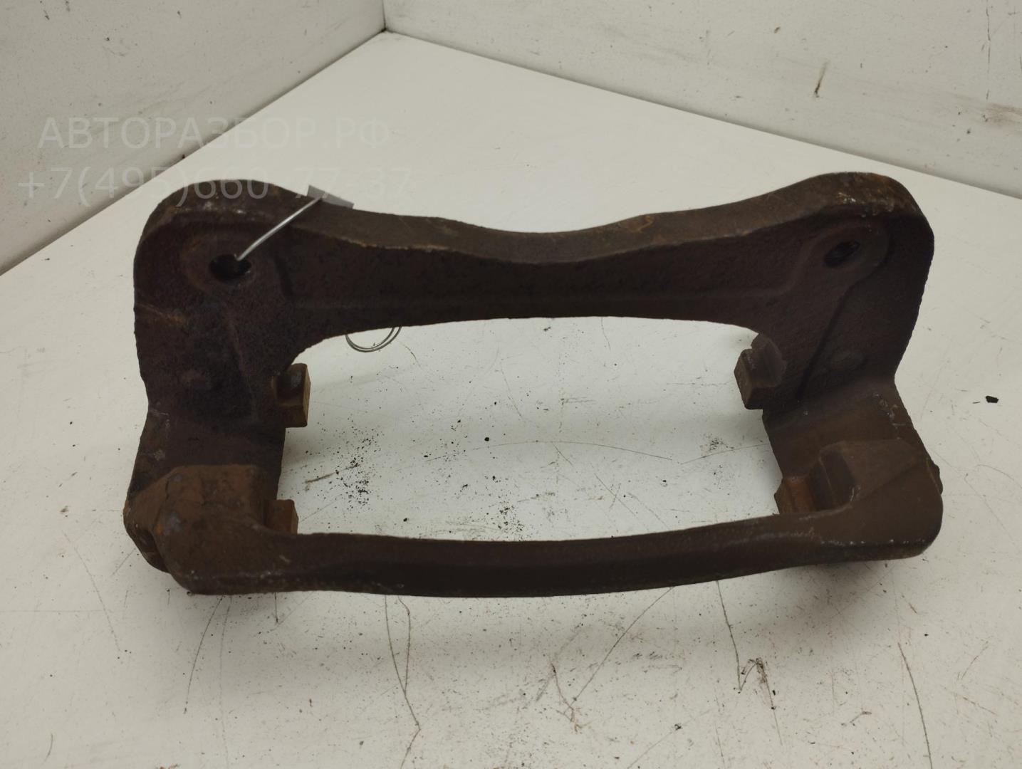 Скоба суппорта переднего