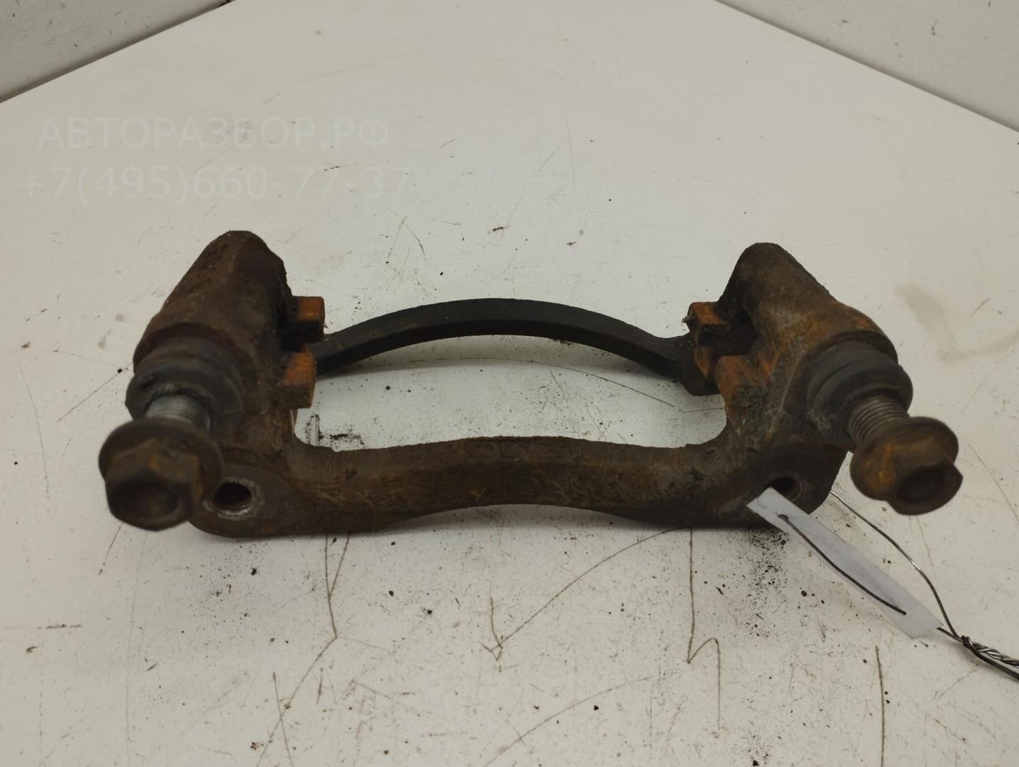 Скоба суппорта заднего