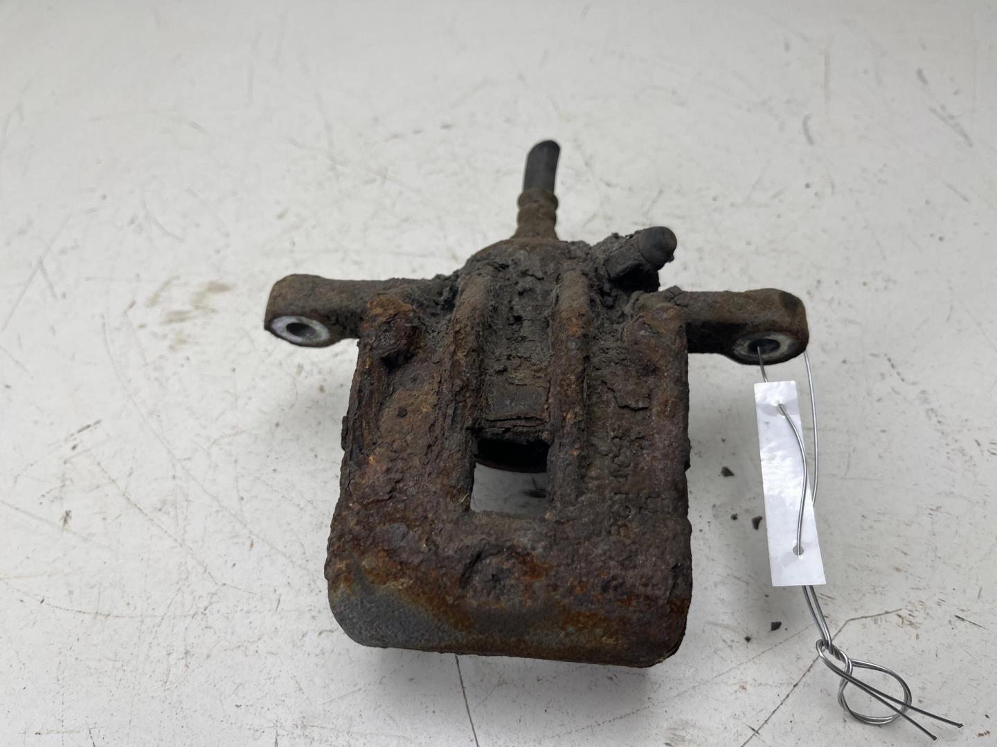 Суппорт задний левый