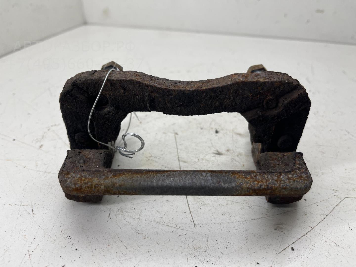 Скоба суппорта заднего