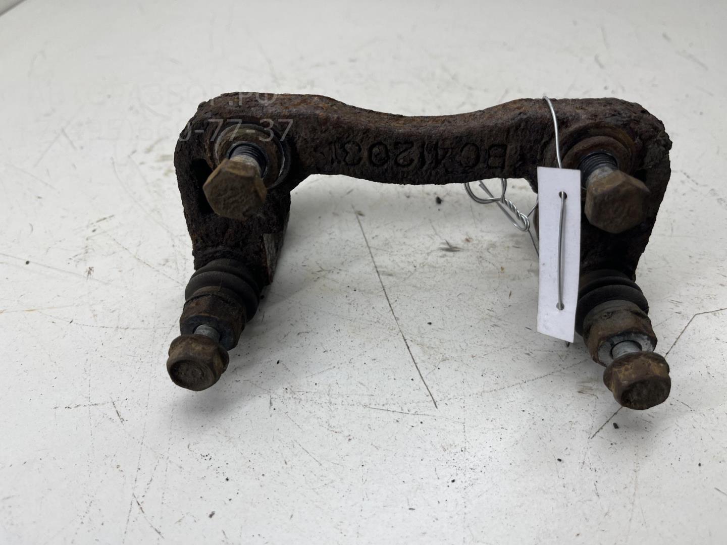 Скоба суппорта заднего