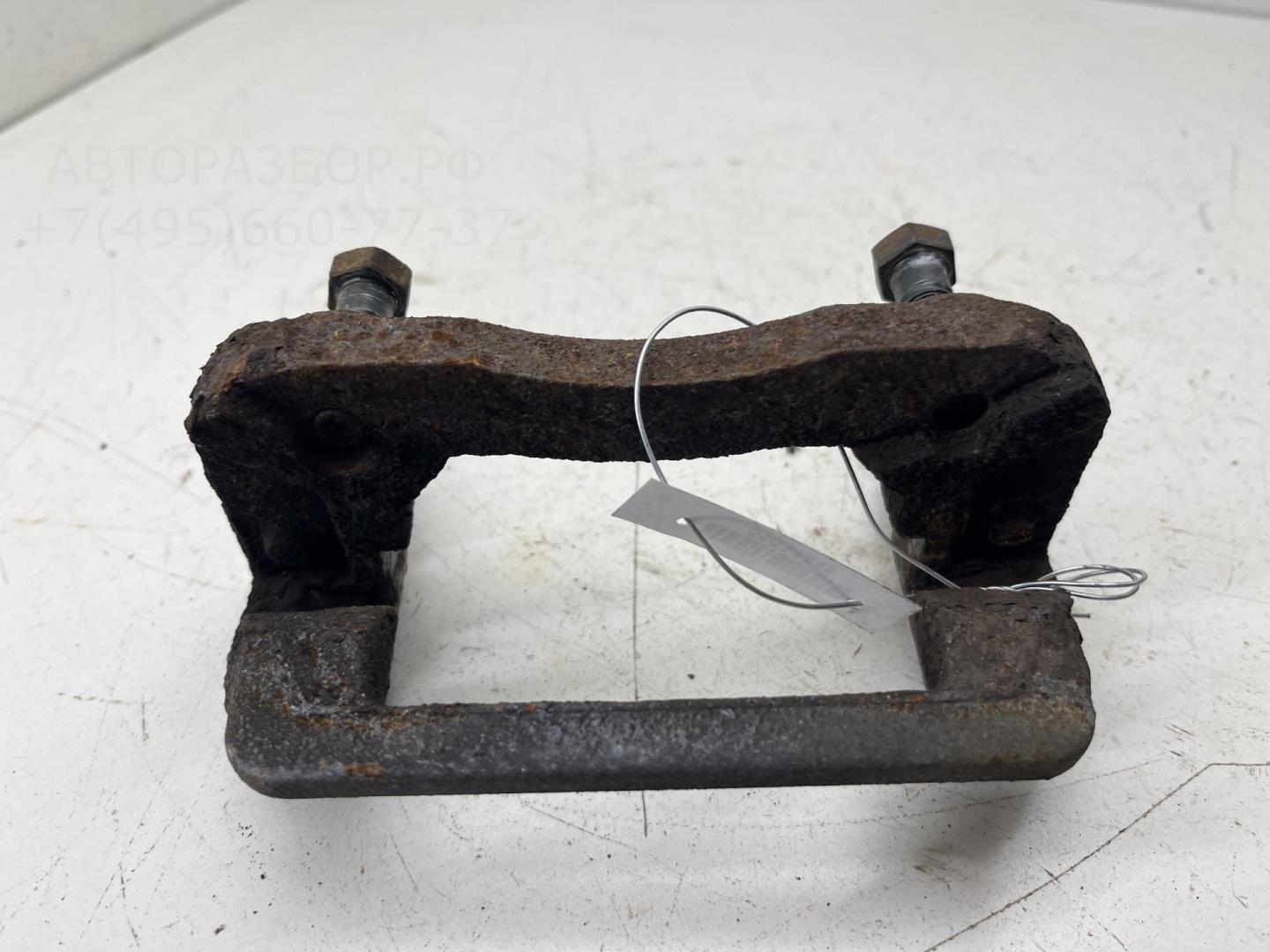 Скоба суппорта заднего