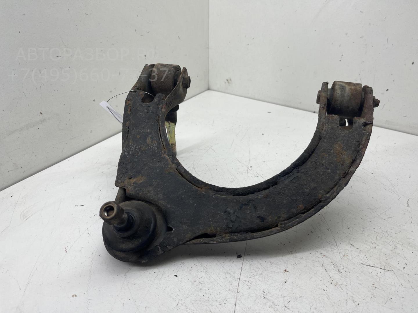 Рычаг передний левый