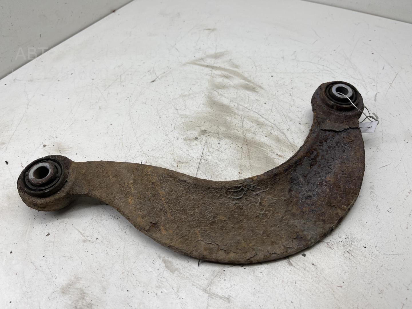 Рычаг задний левый