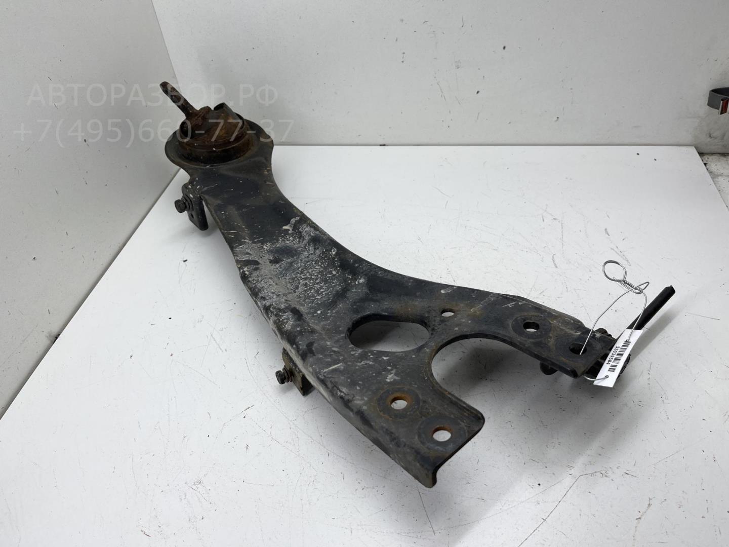 Рычаг задний левый