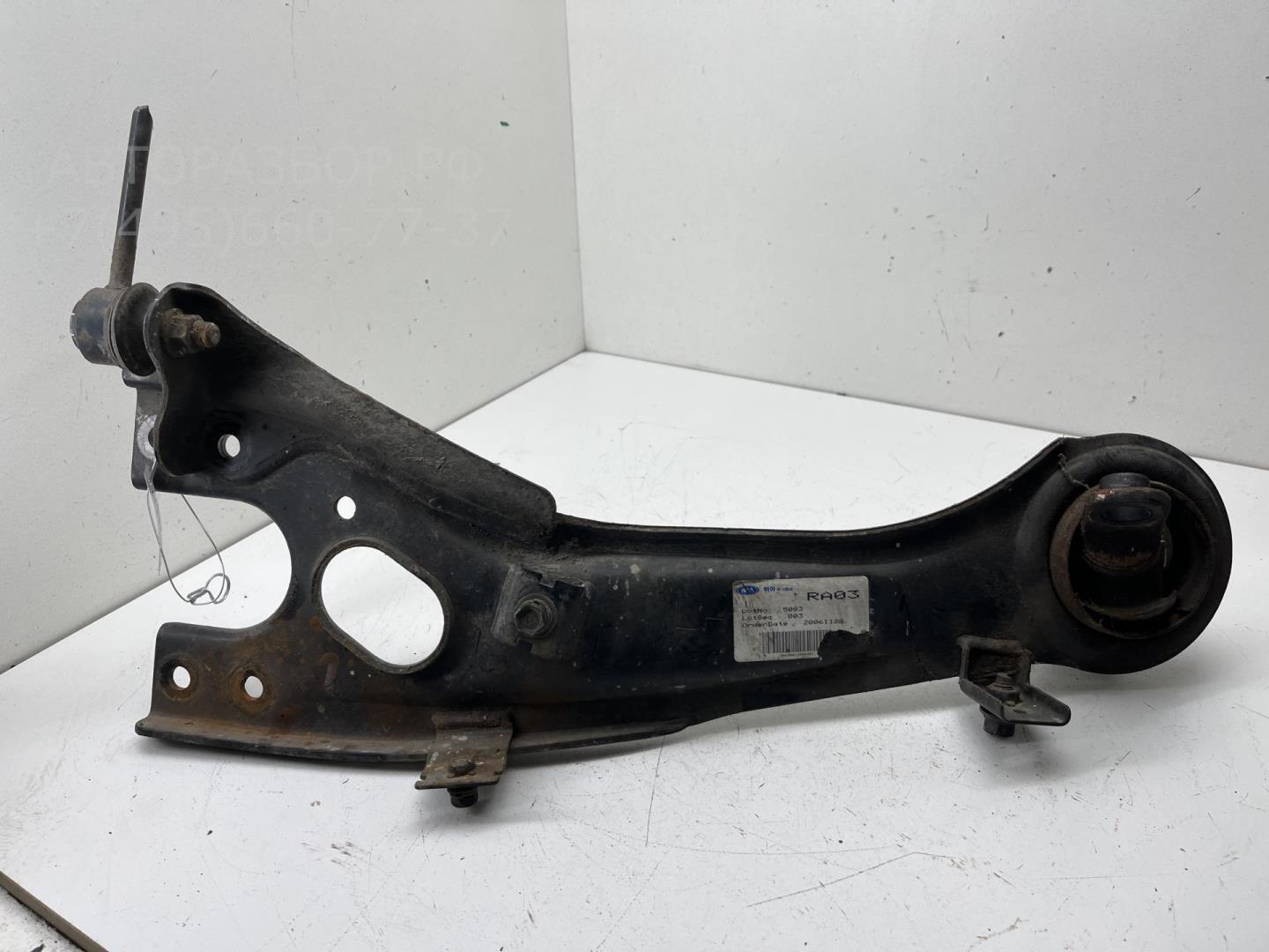 Рычаг задний левый