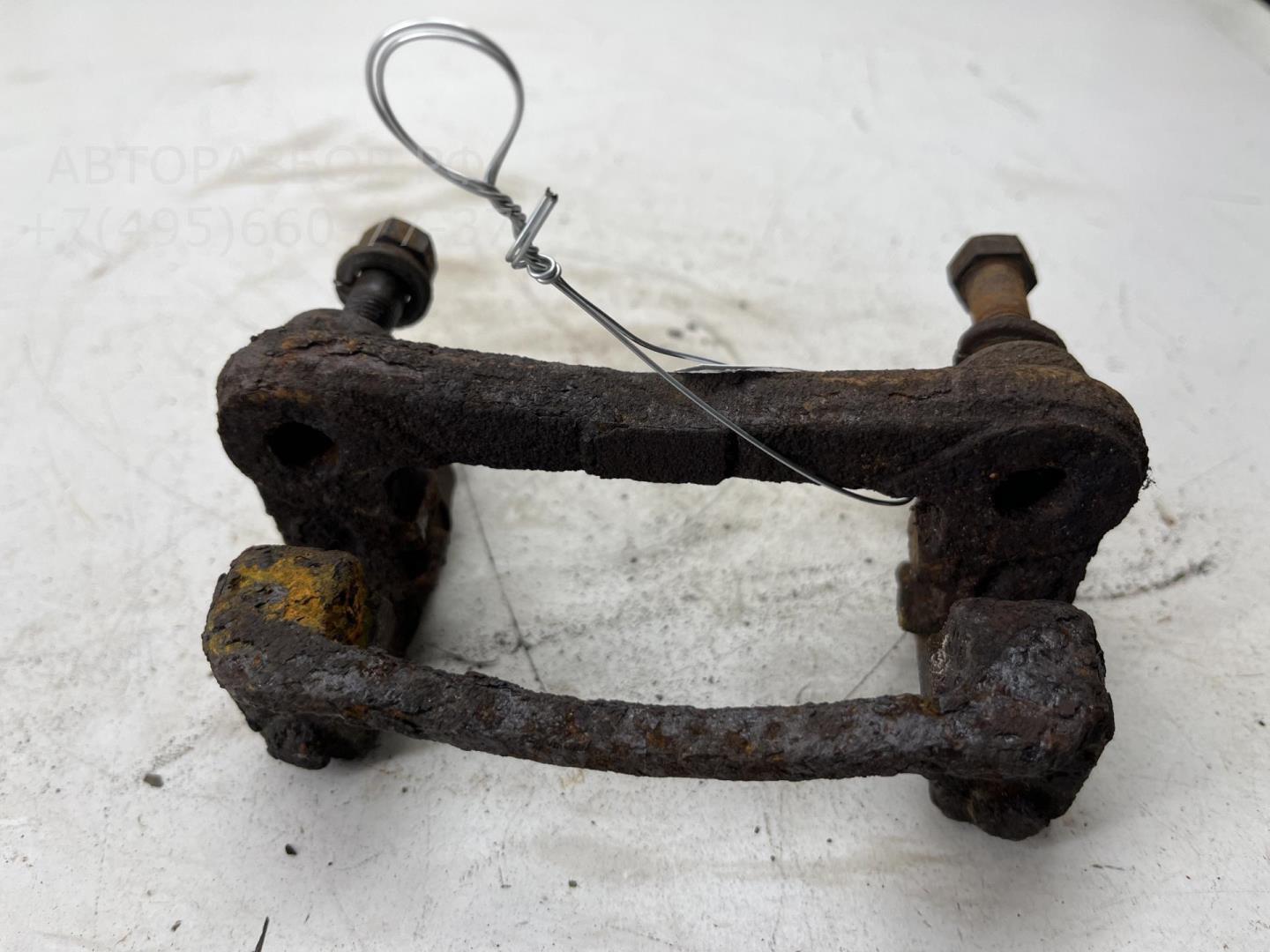 Скоба суппорта заднего