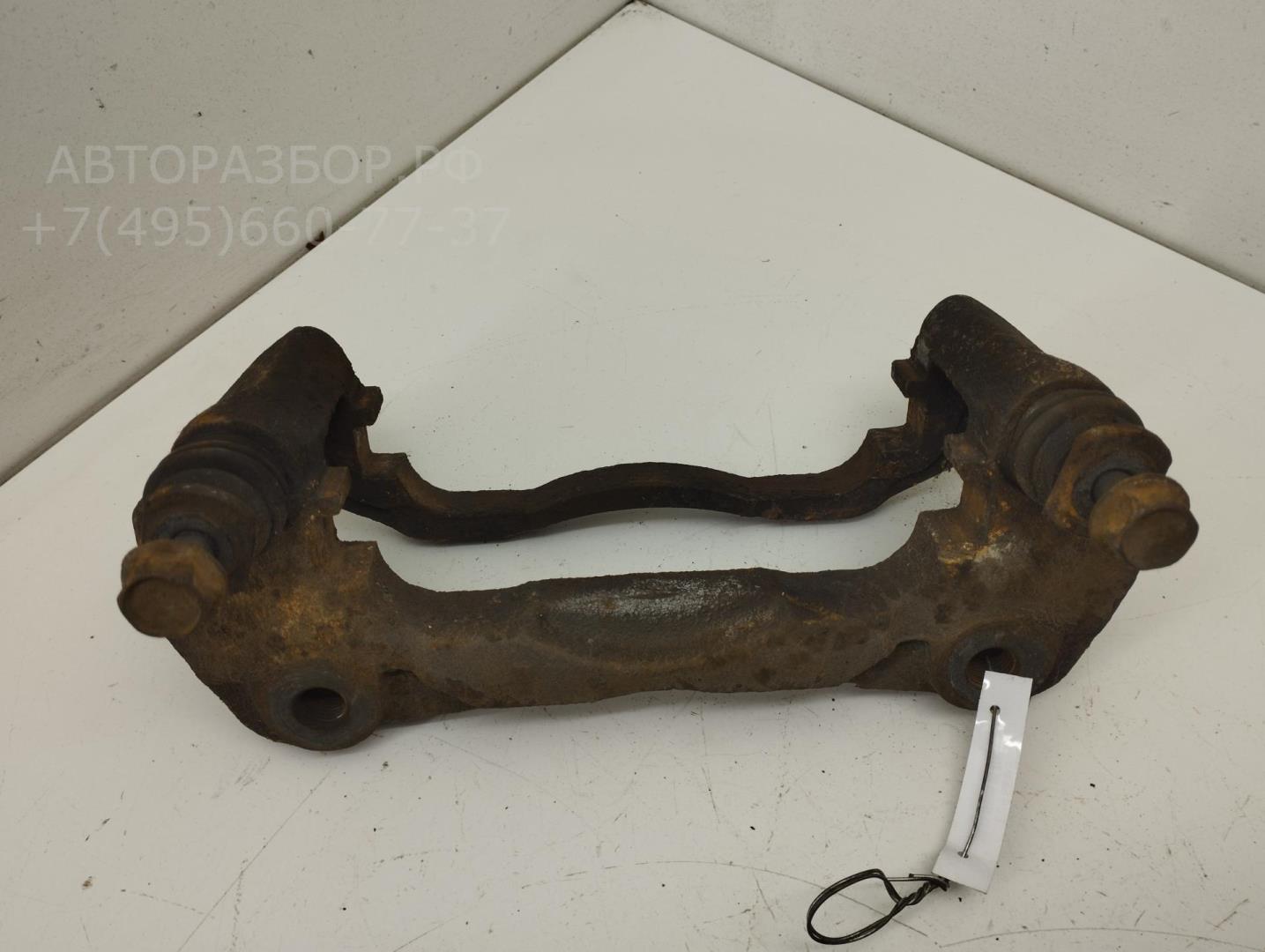 Скоба суппорта переднего