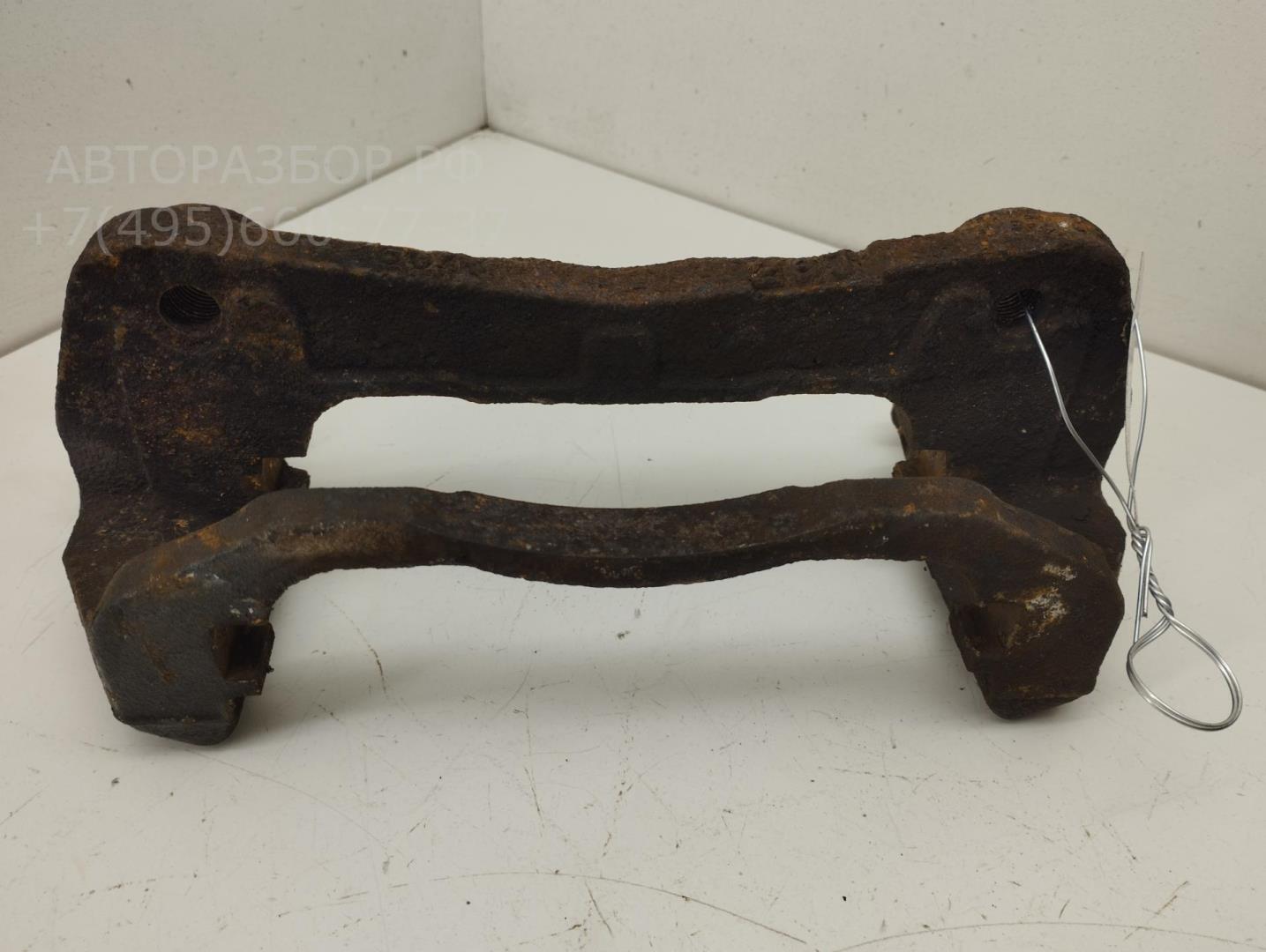 Скоба суппорта переднего