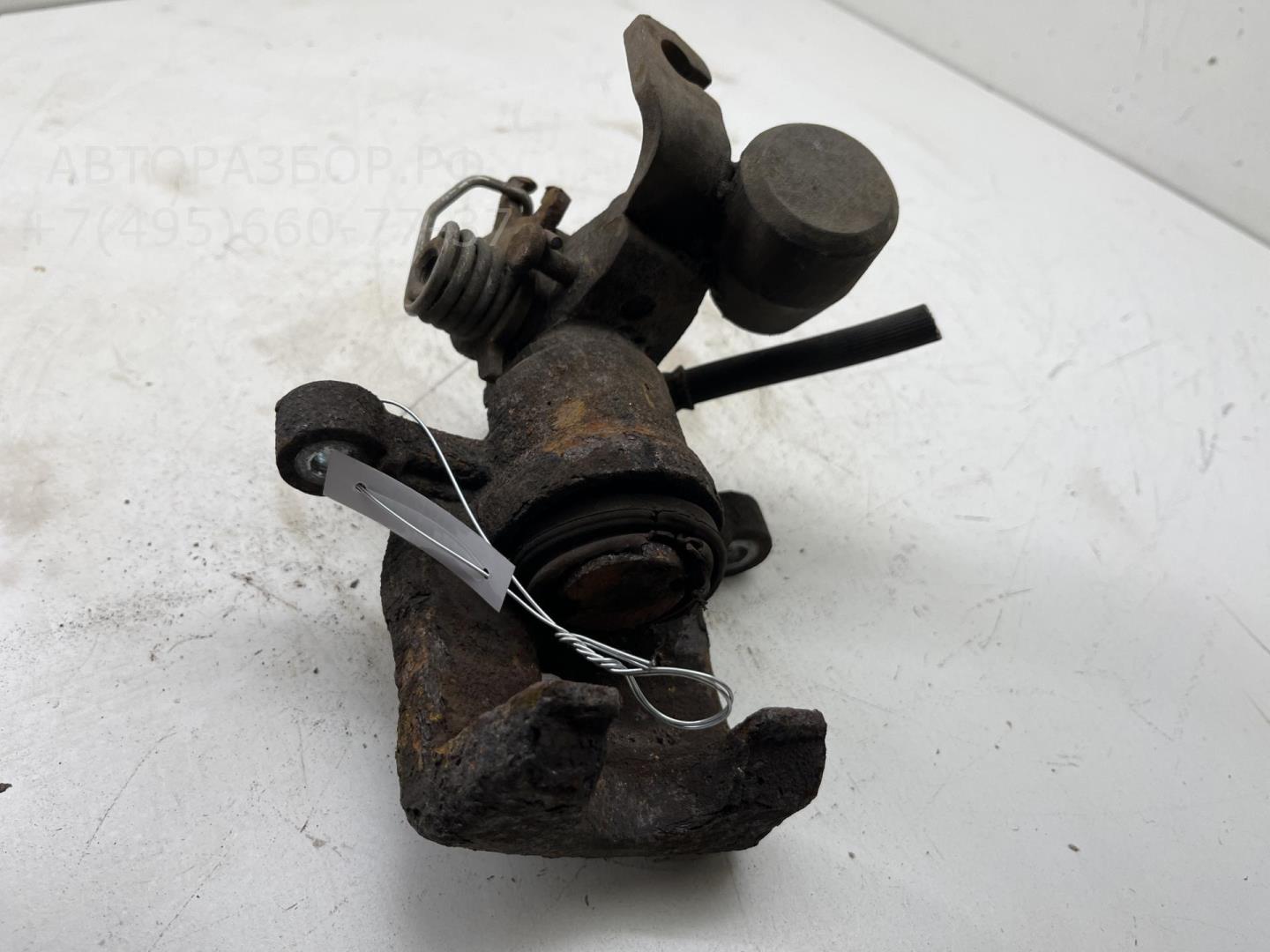 Суппорт задний левый