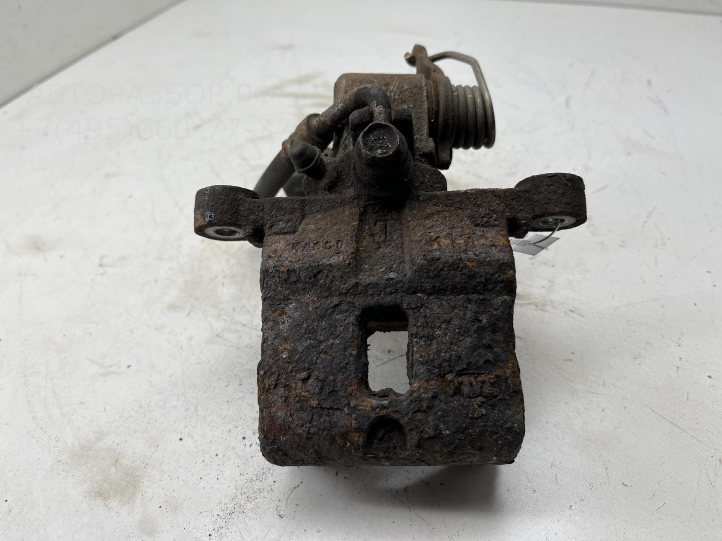 Суппорт задний левый