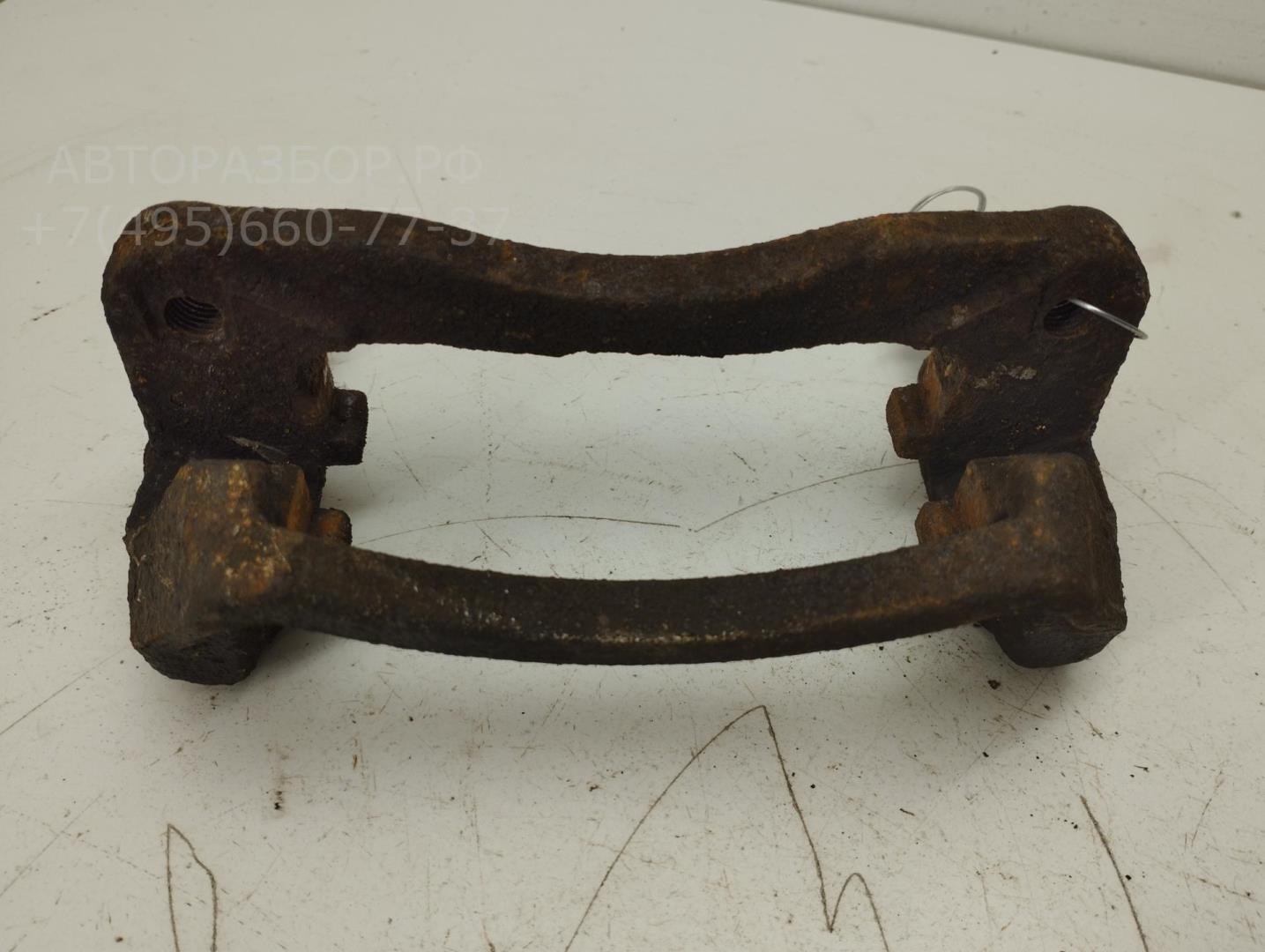 Скоба суппорта заднего