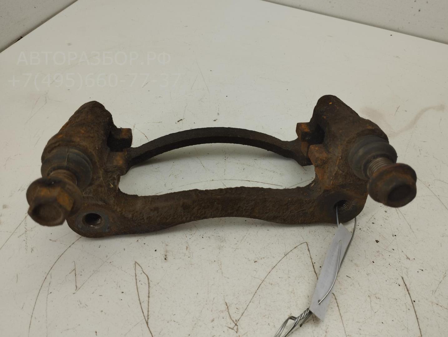 Скоба суппорта заднего