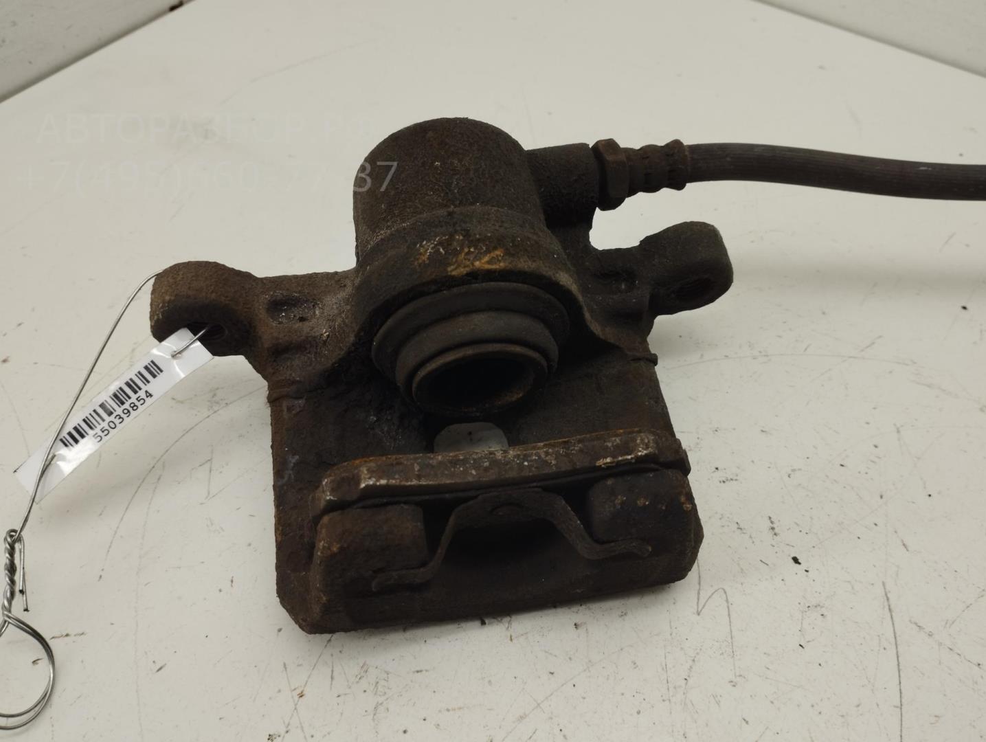 Суппорт задний левый