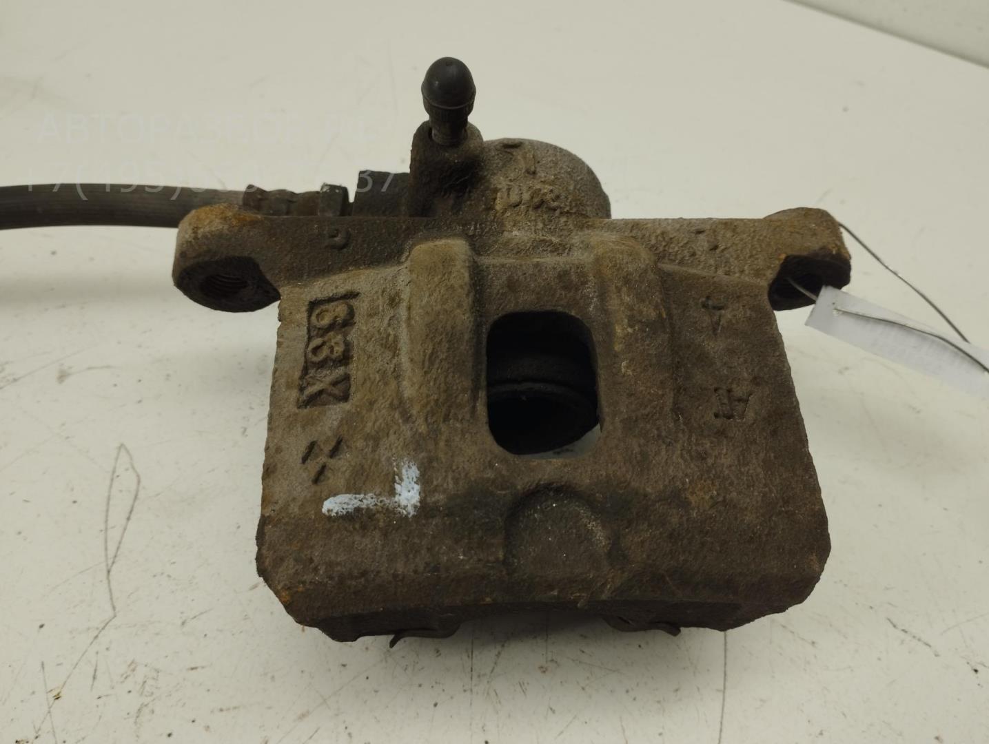 Суппорт задний левый