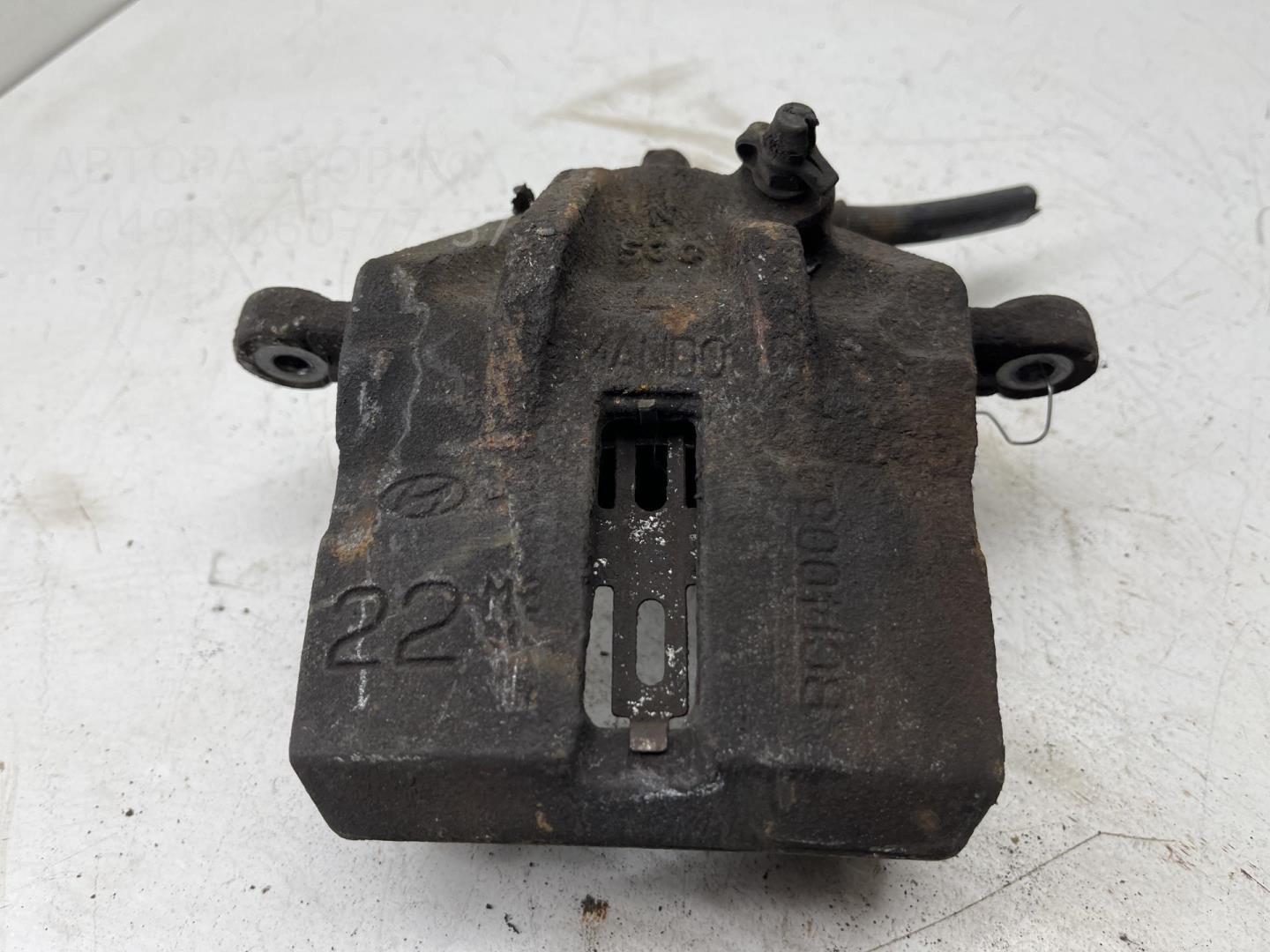 Суппорт передний левый