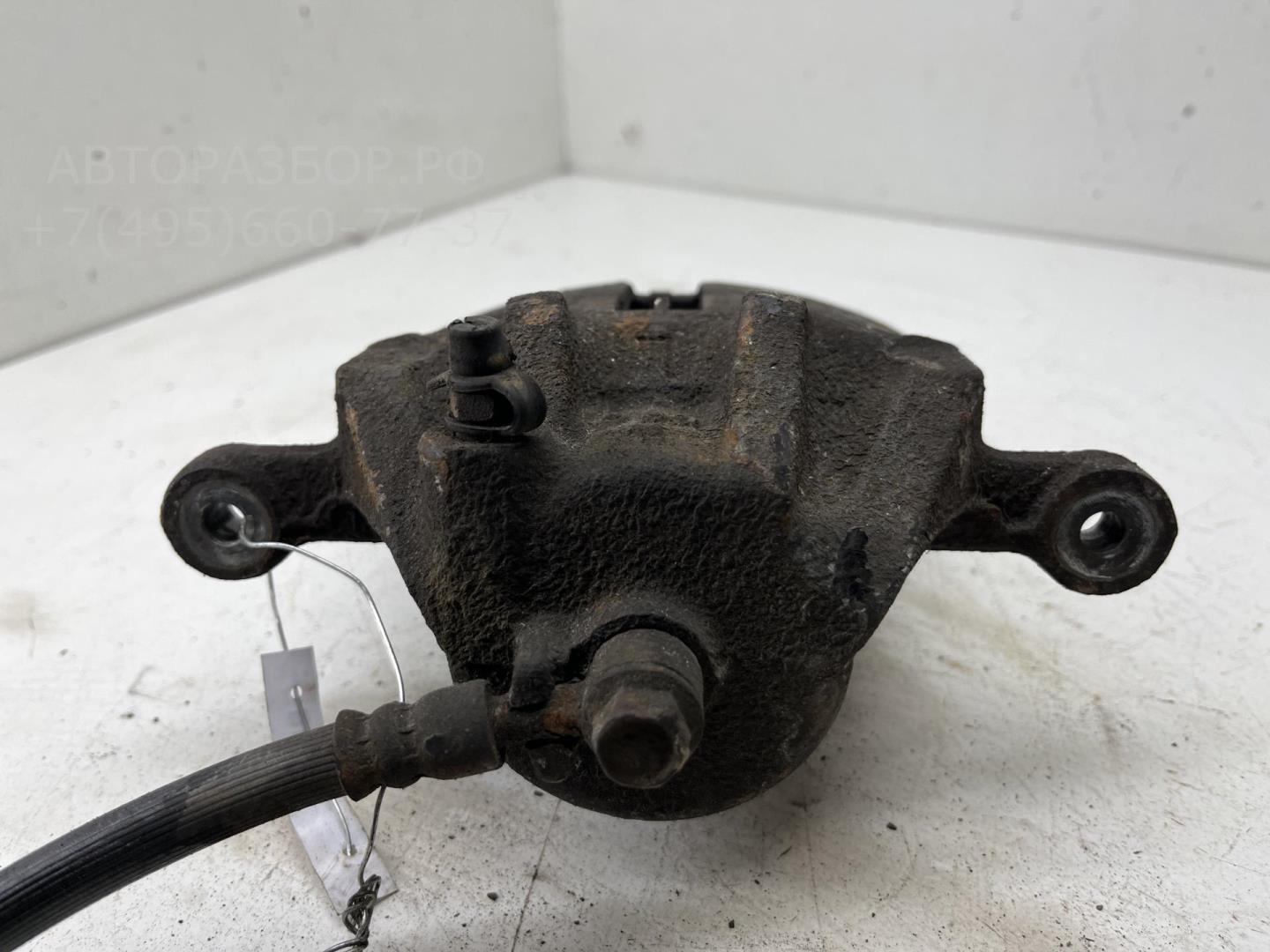 Суппорт передний левый