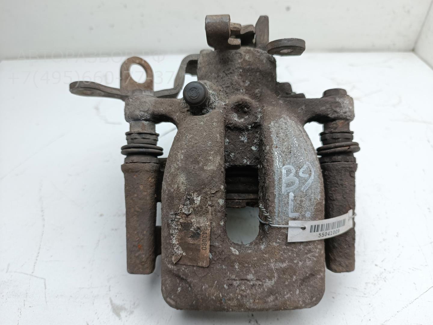 Суппорт задний левый