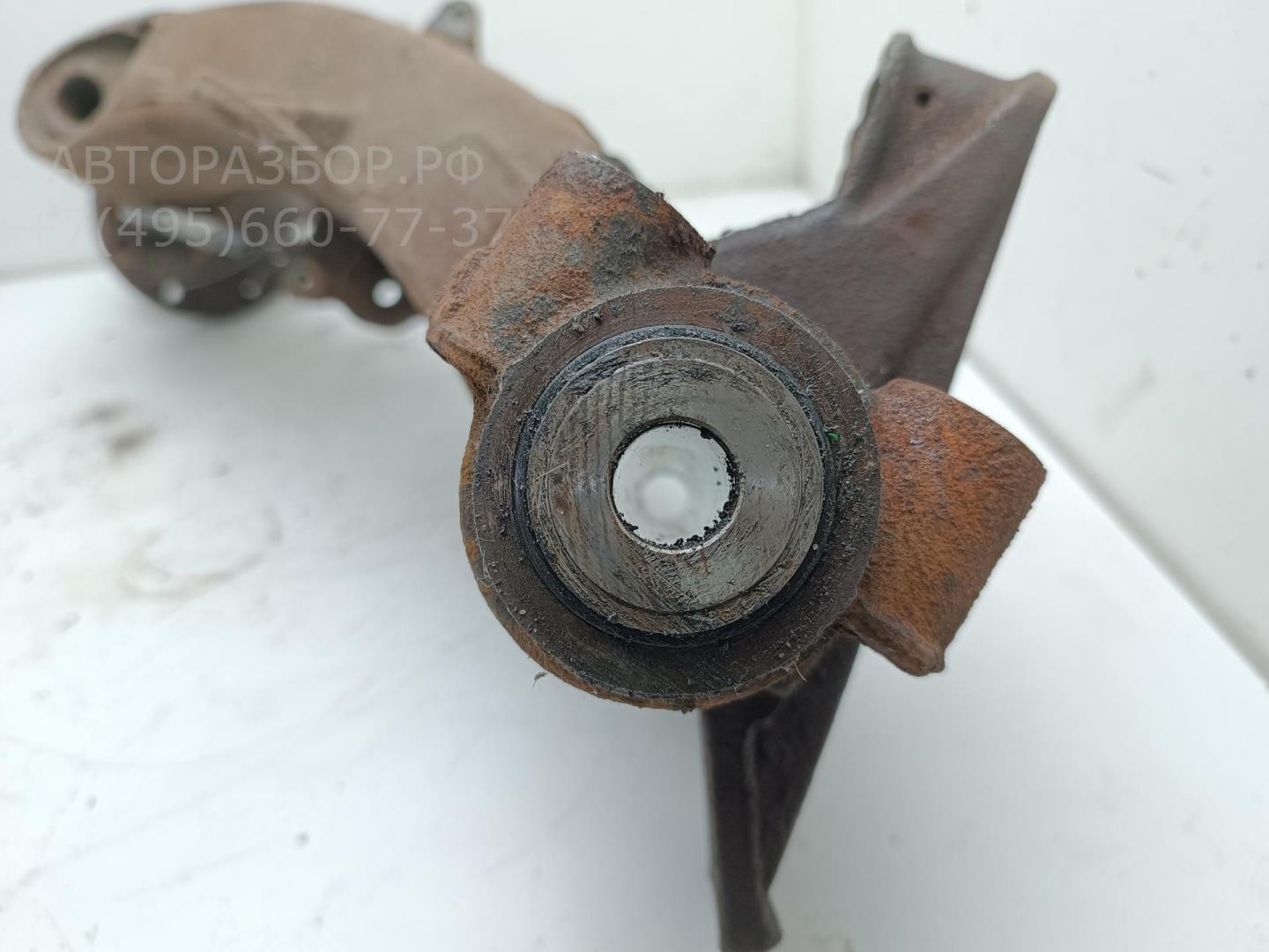 Рычаг задний левый