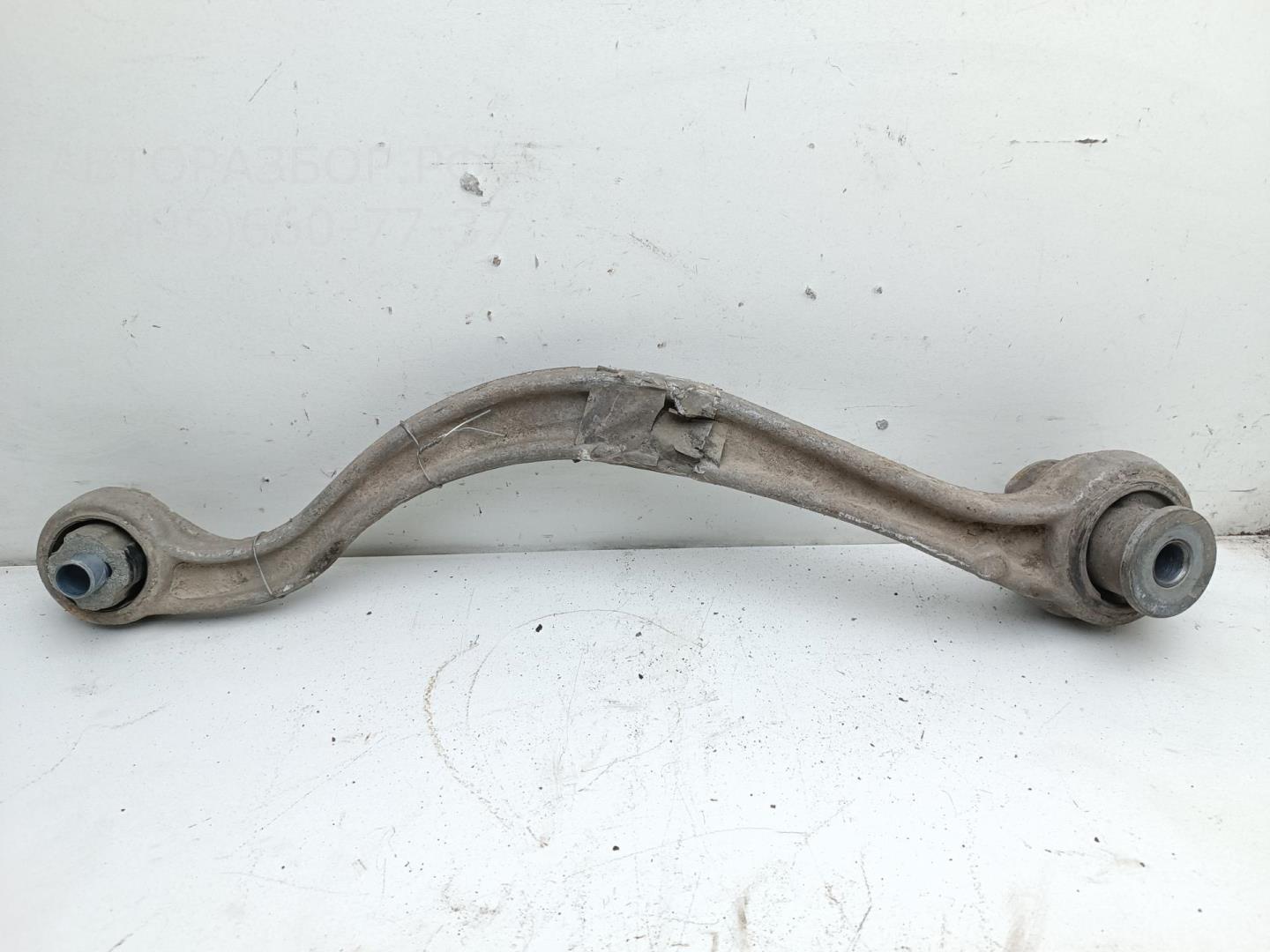 Рычаг задний правый