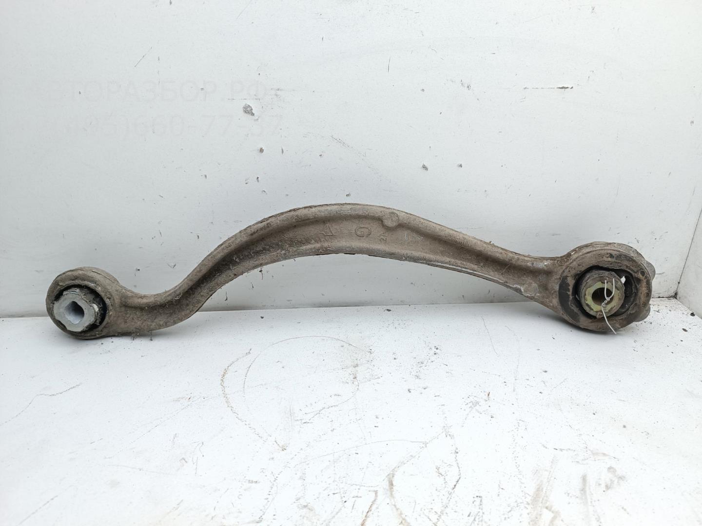 Рычаг задний левый