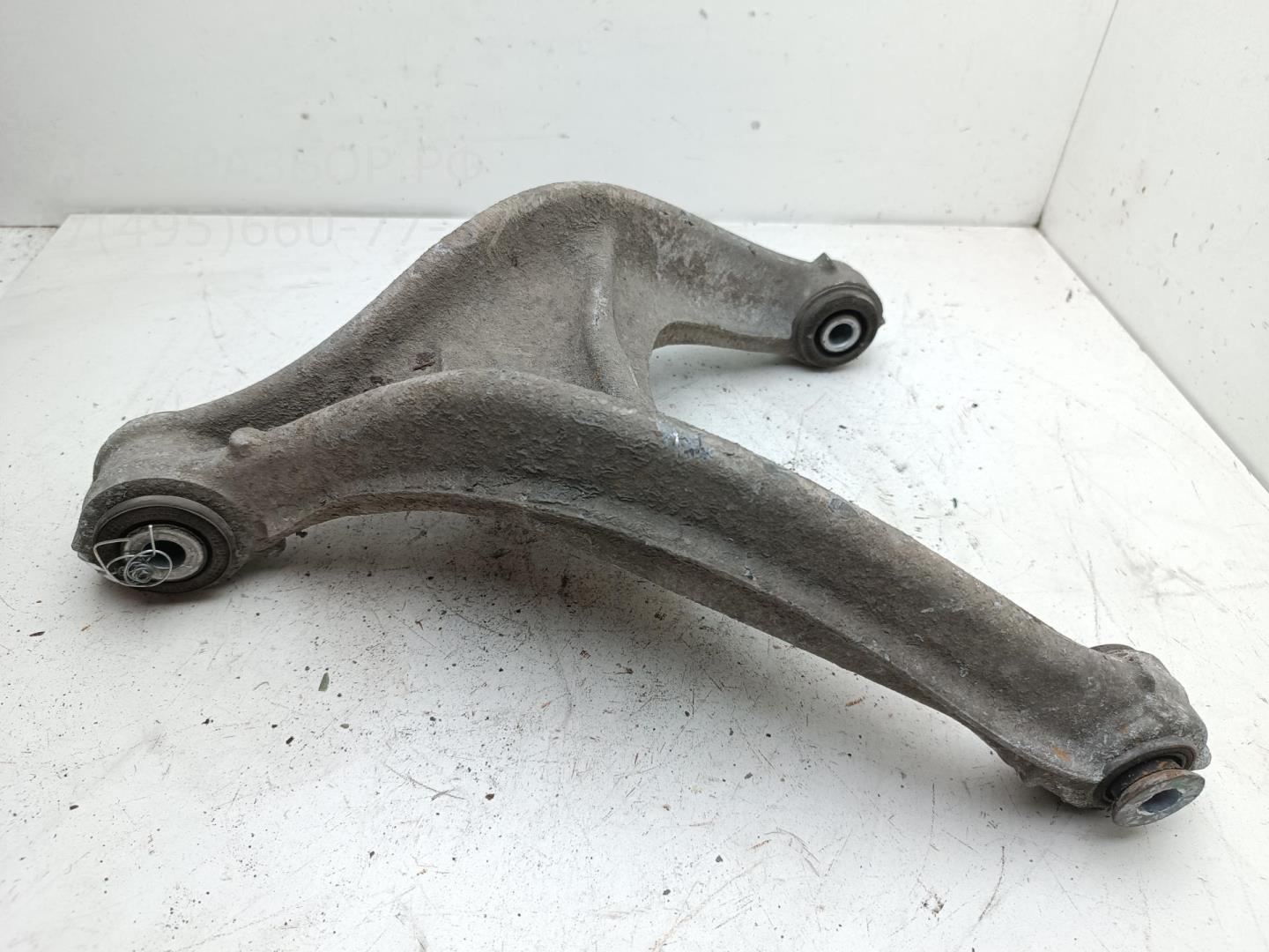 Рычаг задний левый