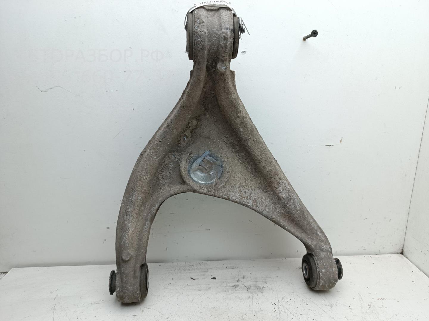 Рычаг задний левый