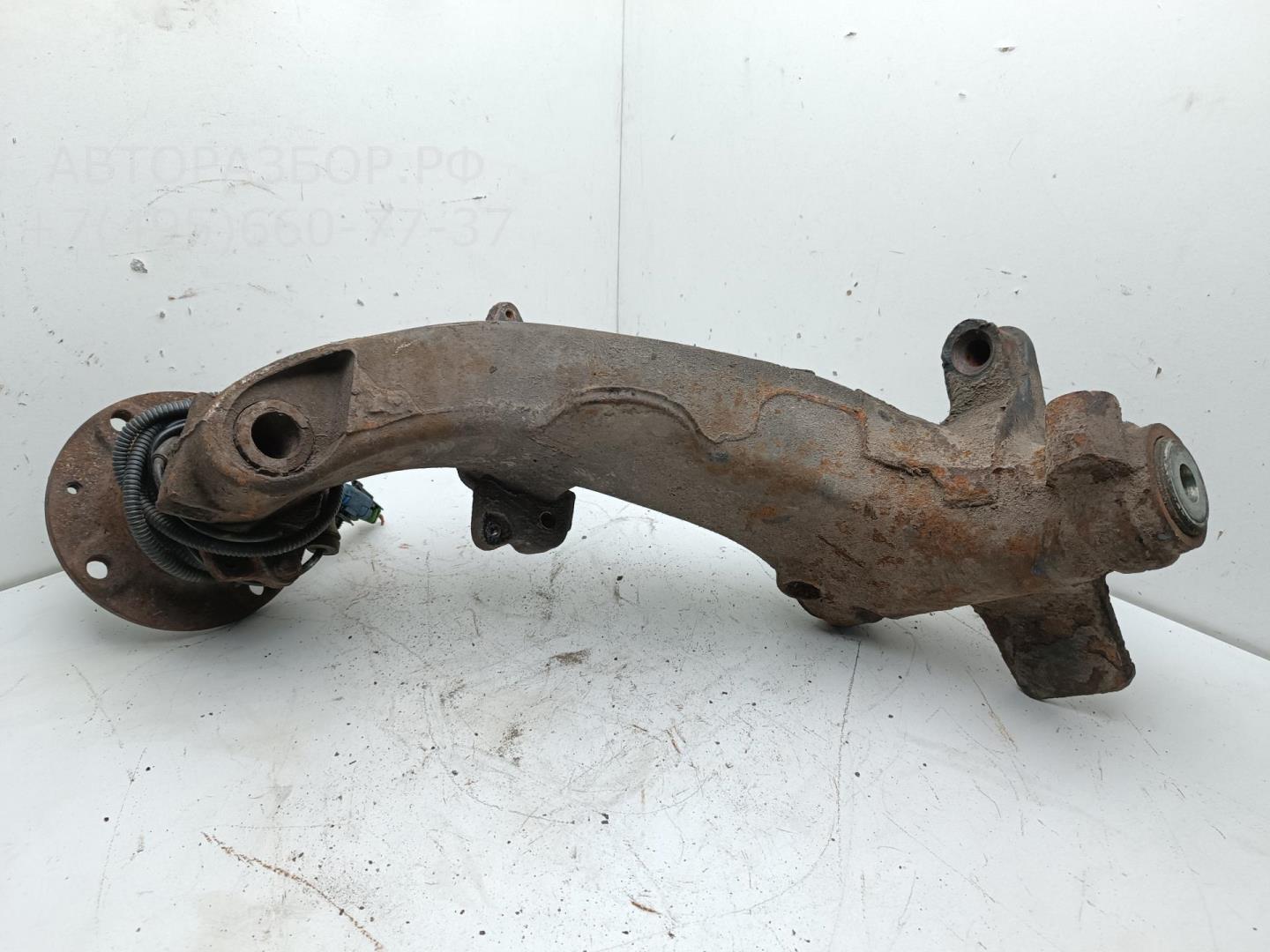 Рычаг задний правый