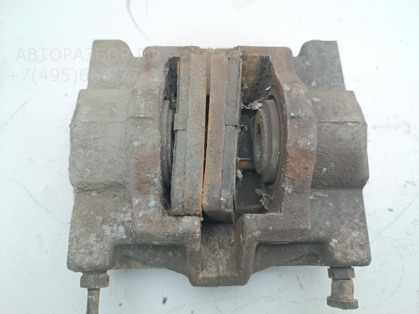 Суппорт задний левый