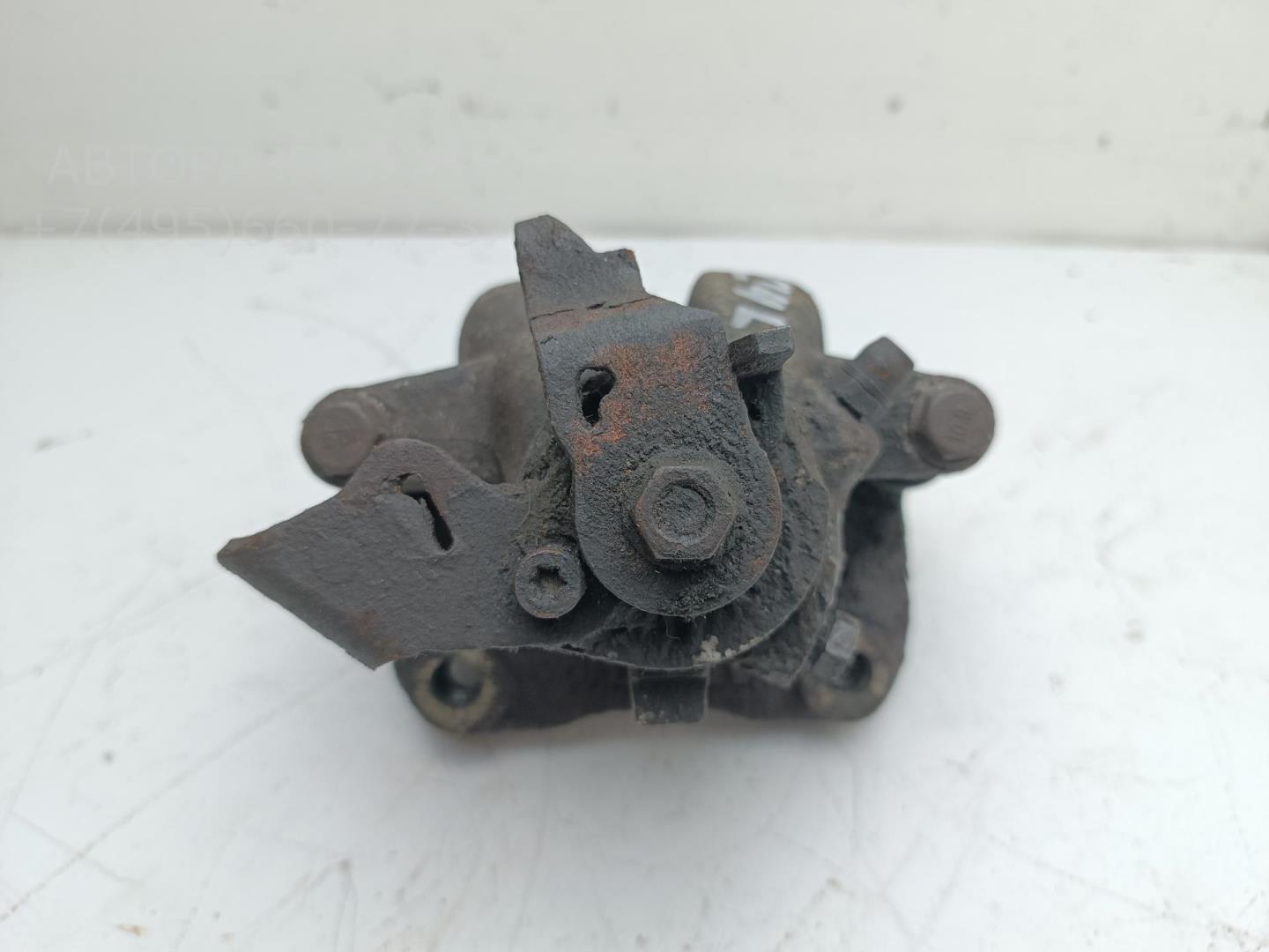 Суппорт задний левый