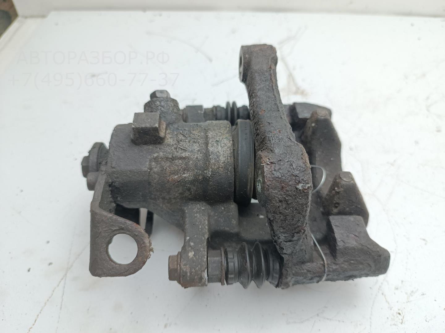 Суппорт задний левый