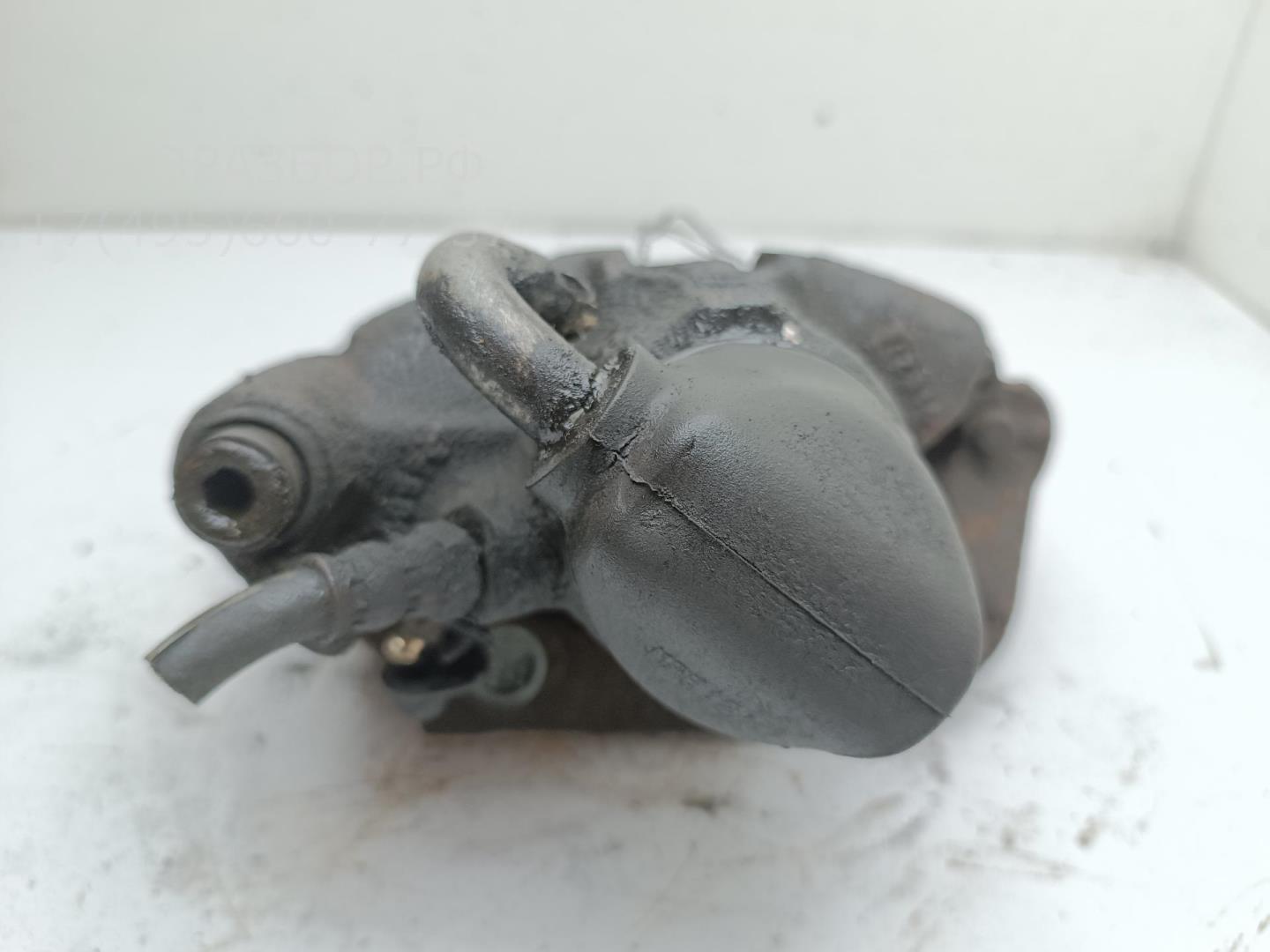 Суппорт передний левый