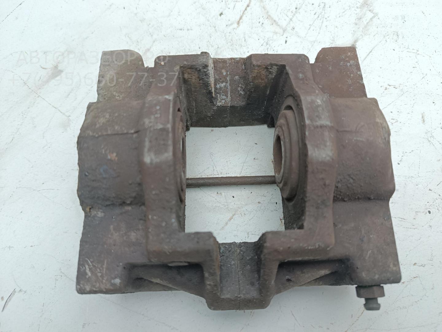 Суппорт задний левый