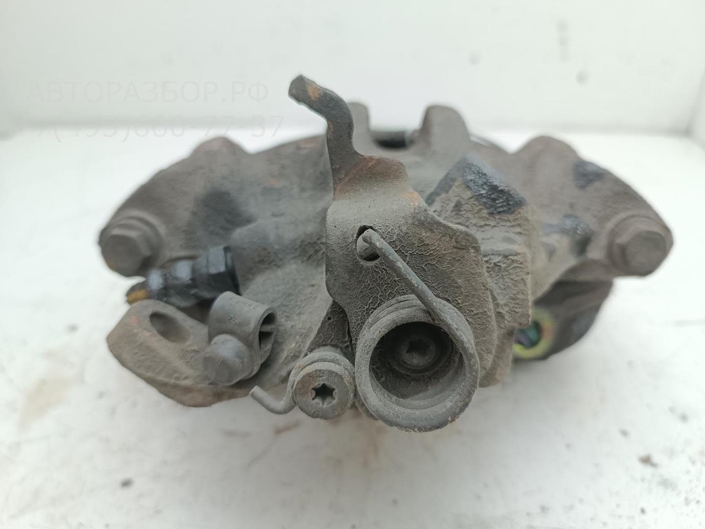 Суппорт передний левый