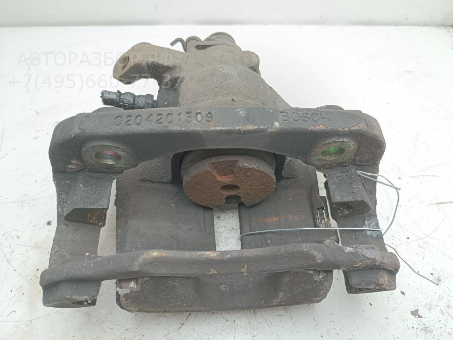 Суппорт передний левый