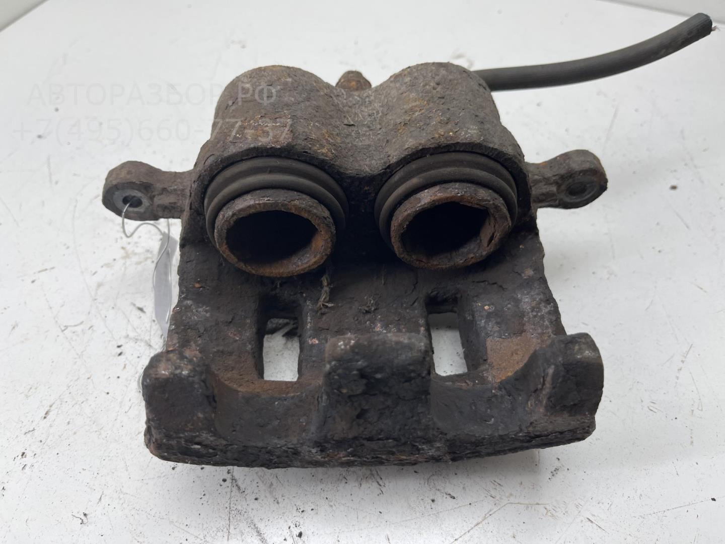 Суппорт передний левый