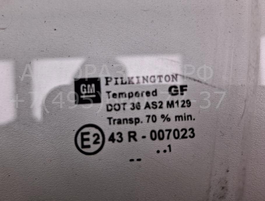 Стекло двери передней левой