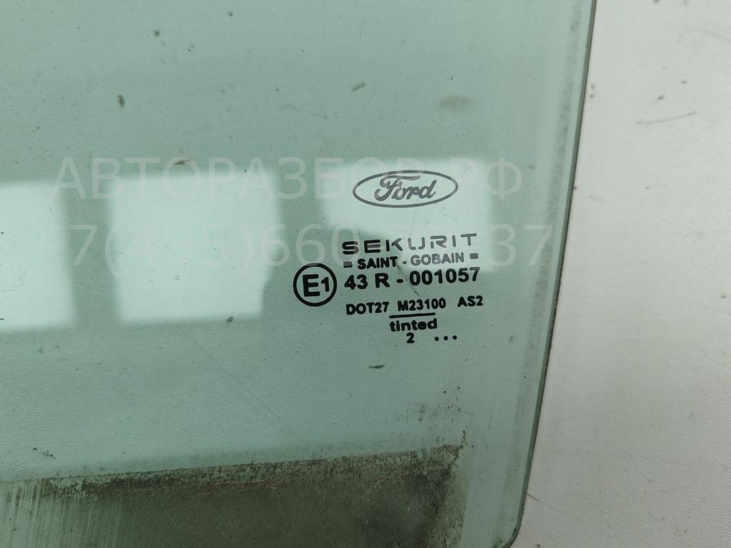 Стекло двери передней левой