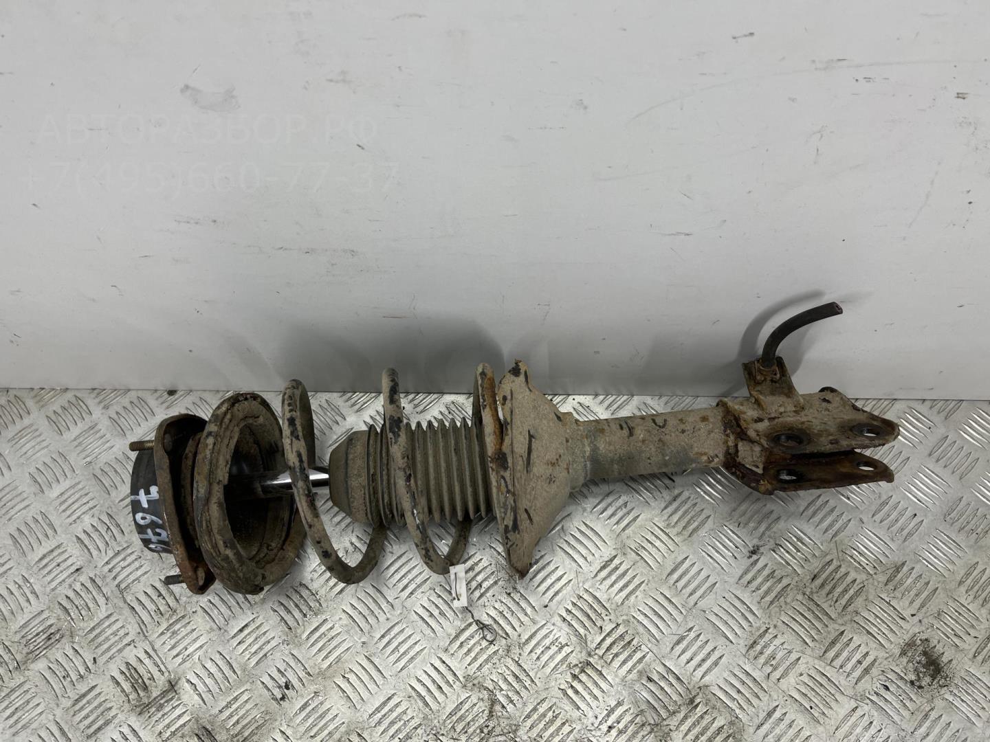 Амортизатор передний левый