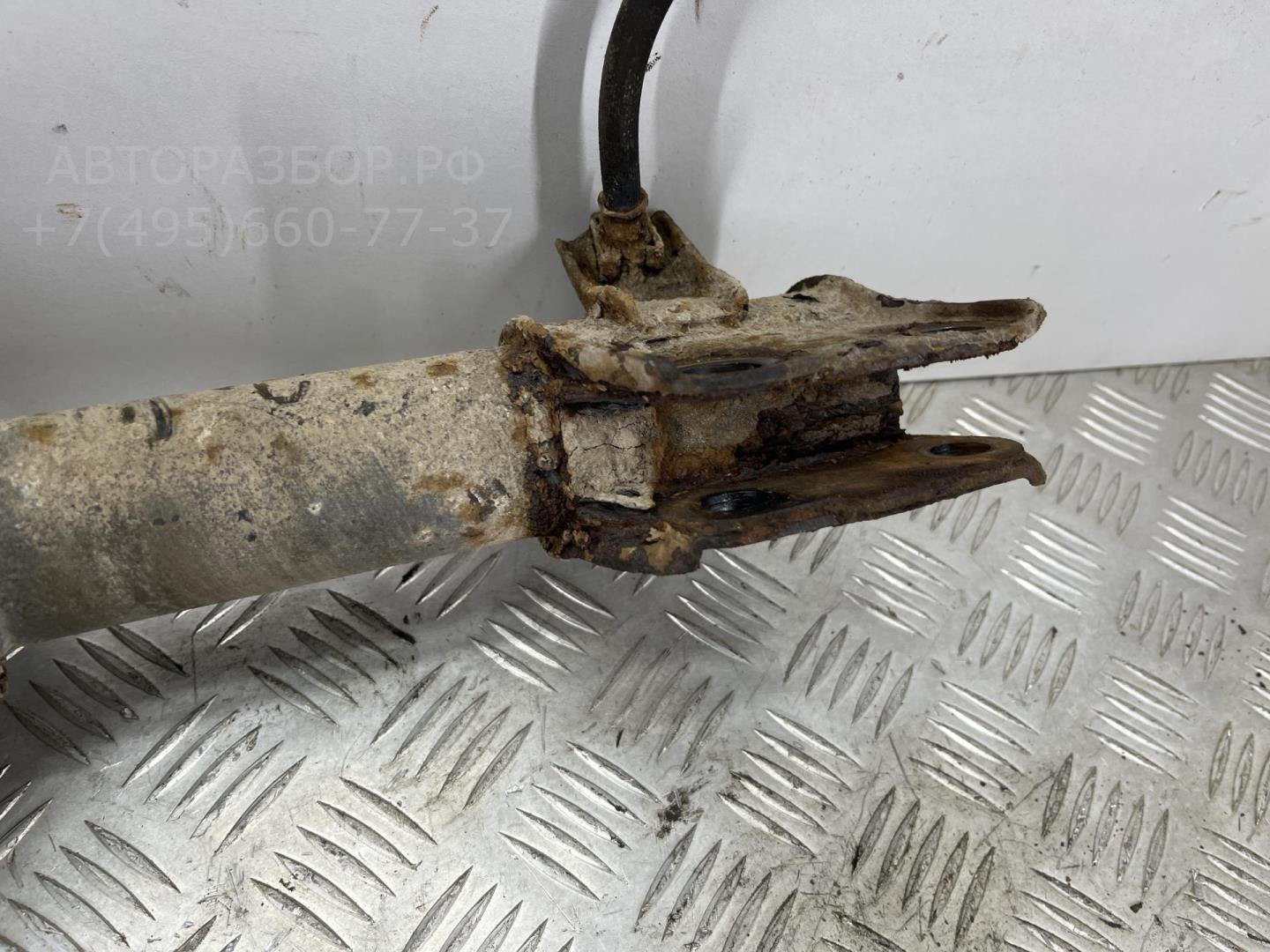 Амортизатор передний левый