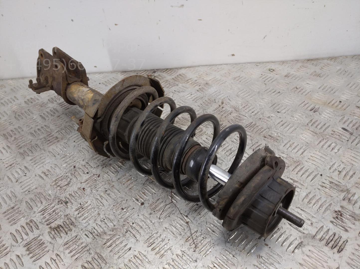 Амортизатор передний левый