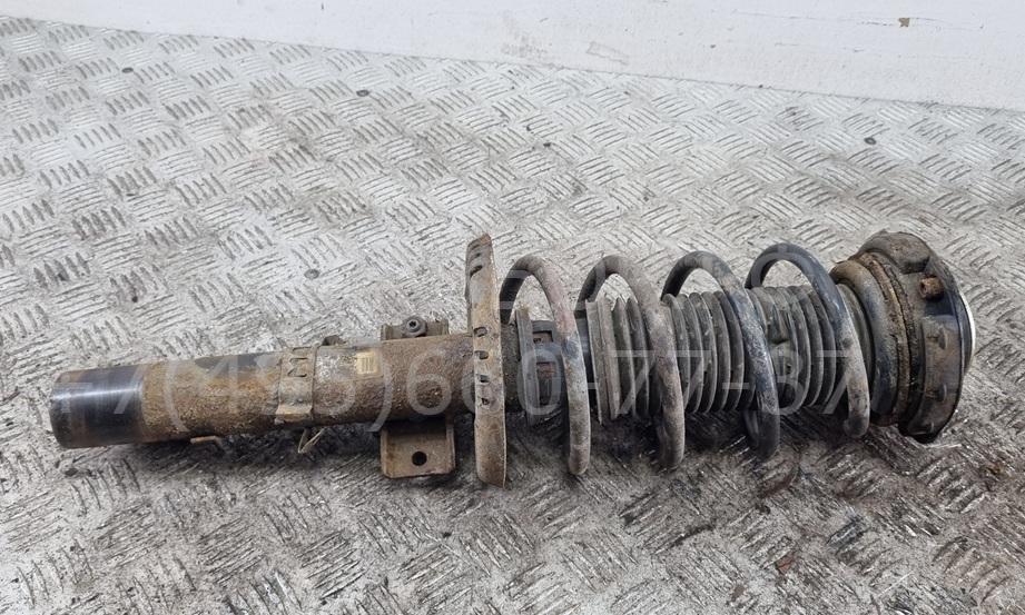 Амортизатор передний левый