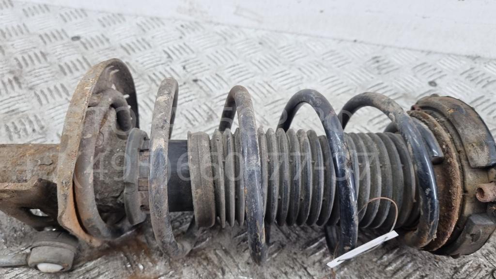 Амортизатор передний левый