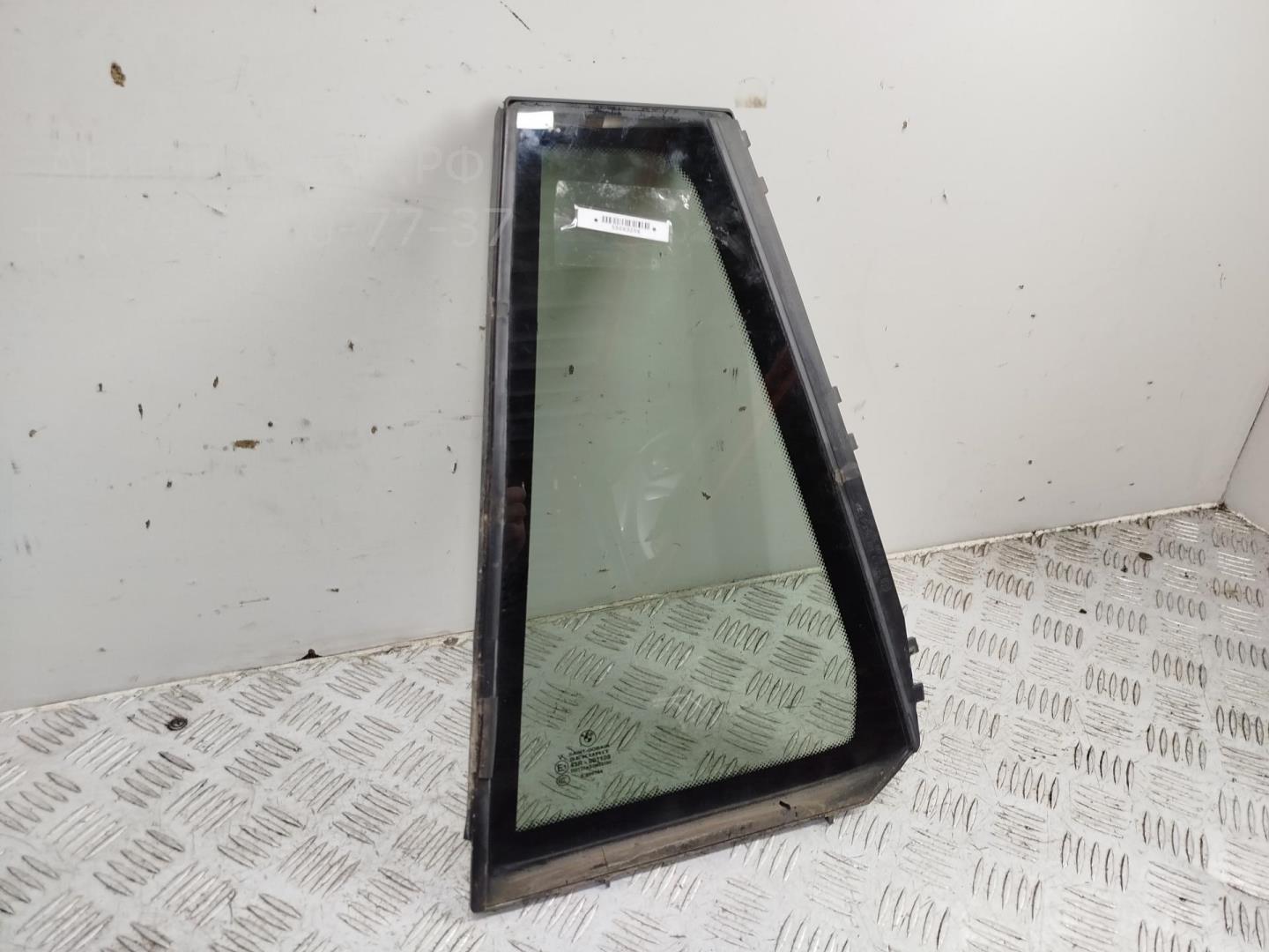 Стекло двери задней левой (форточка)