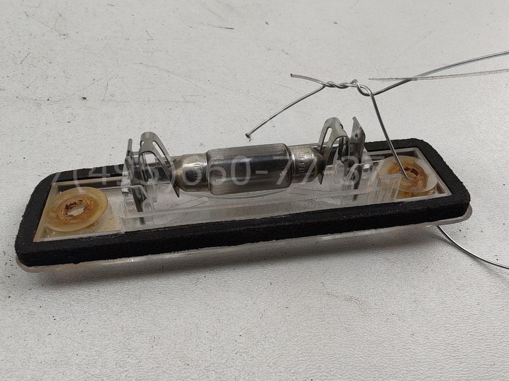 Фонарь подсветки номера